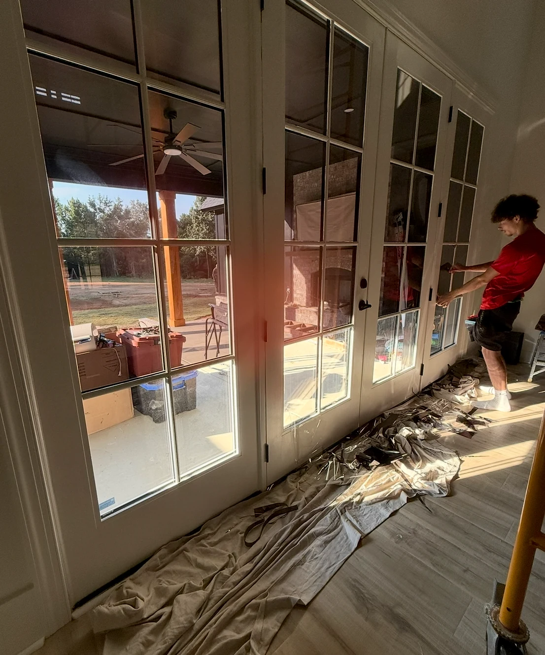ProLine installer working on residential French-door glass